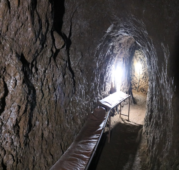 Entrance to an old Chagga cave used historically for protection and family shelter in the Kilimanjaro region | Kili Quests