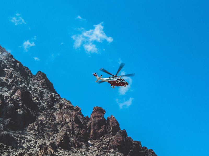 Helicopter flying over Mount Kilimanjaro during an emergency evacuation