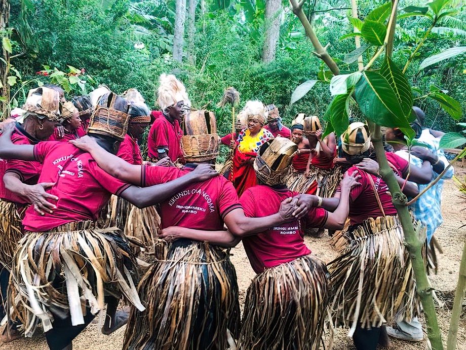 : Chagga performers dancing in traditional attire for visiting tourists in the Kilimanjaro region | Kili Quests